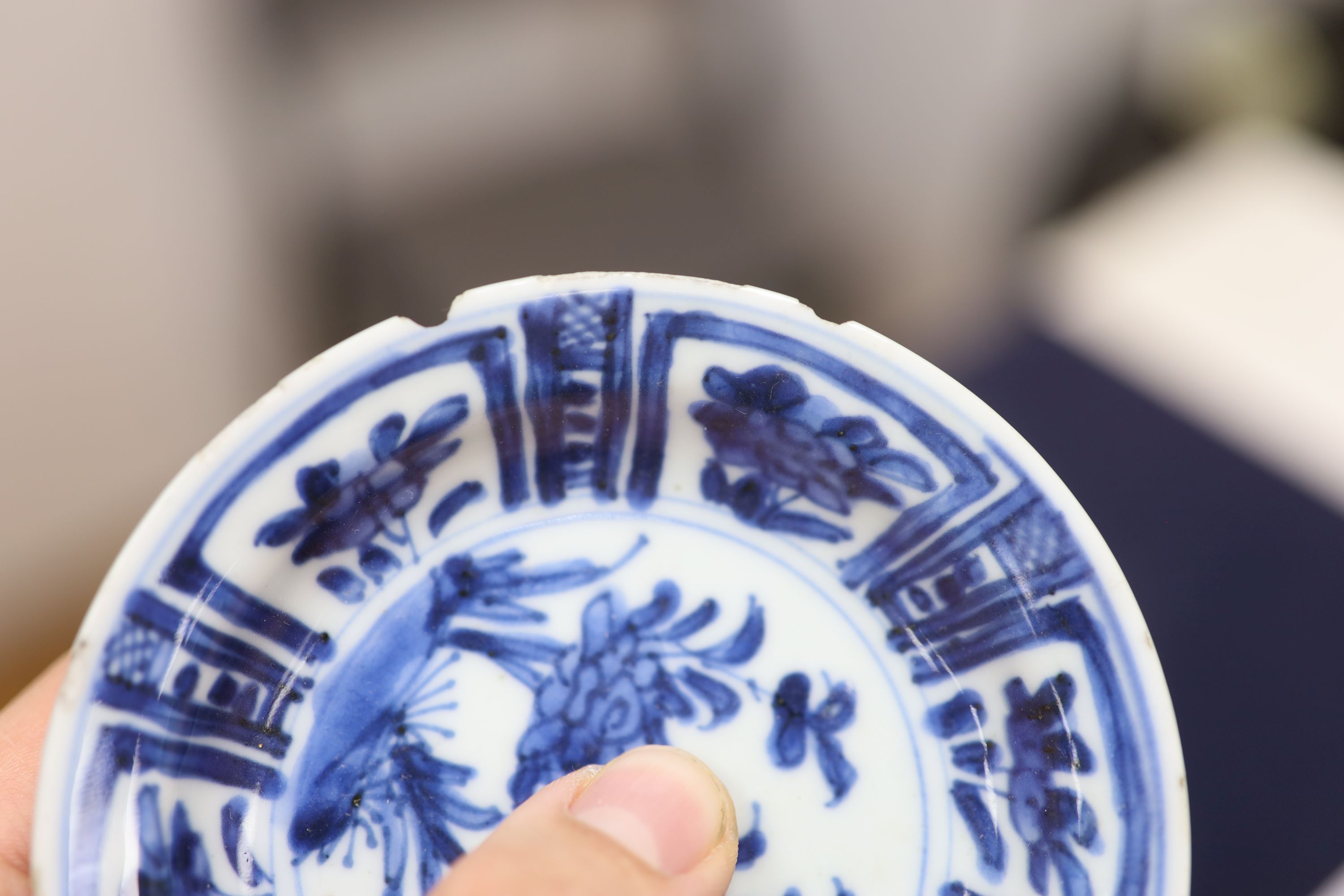 A pair of Chinese blue and white dishes and a similar jar and cover, tallest 12cm